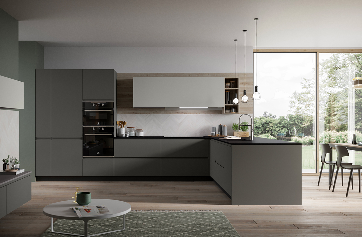 Fly: cucina angolare a penisola aperta su living e zona pranzo.