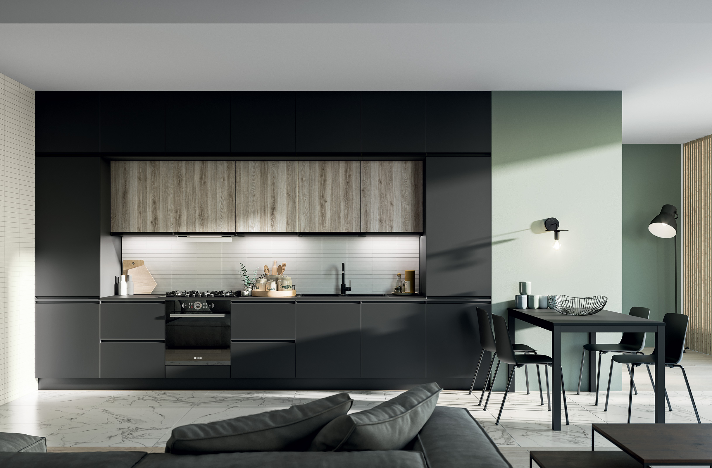 Una Prima Cucine con moduli sopra-colonne e pensili per sfruttare lo spazio.