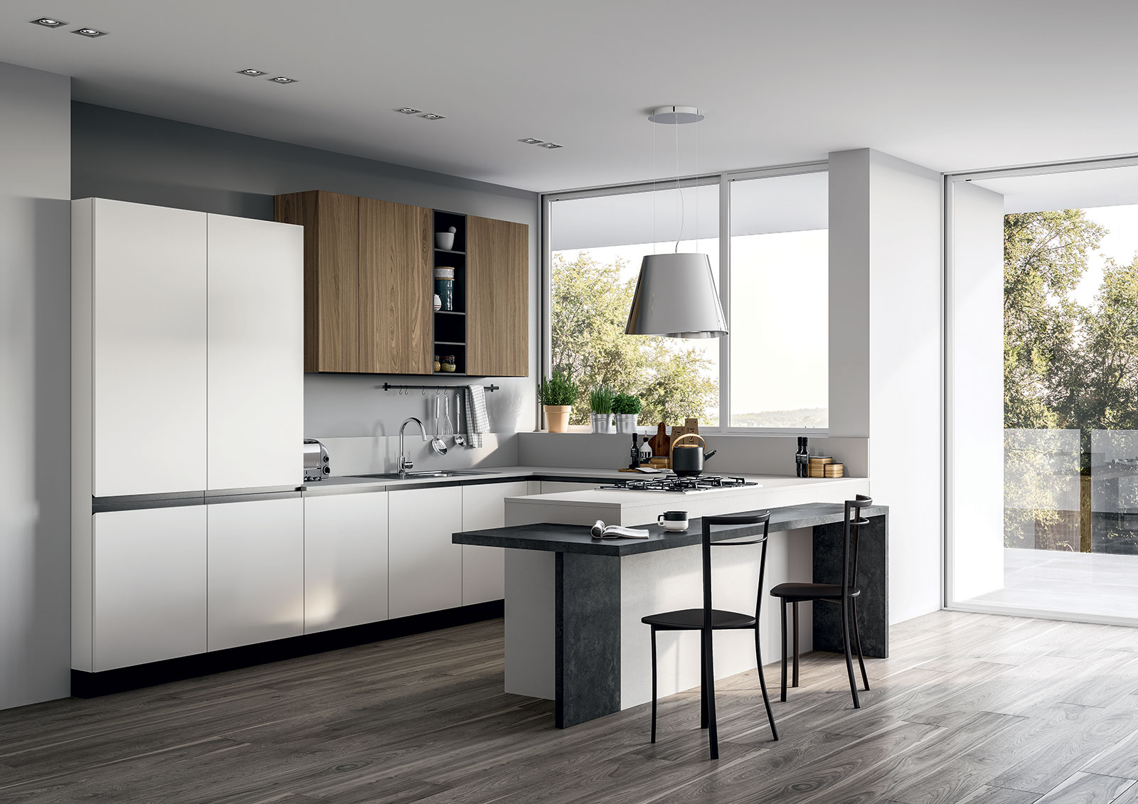 Cucina a golfo Zoe con penisola e piano ad altezza tavolo.
